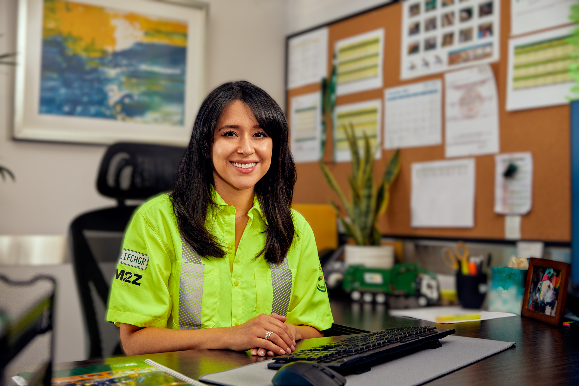 Picture of a WM Employee at desk