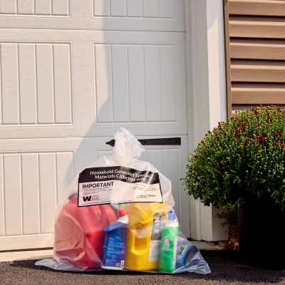 Containment bag in front of garage